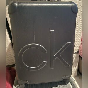 Calvin Klein Black and Silver Zippered Luggage